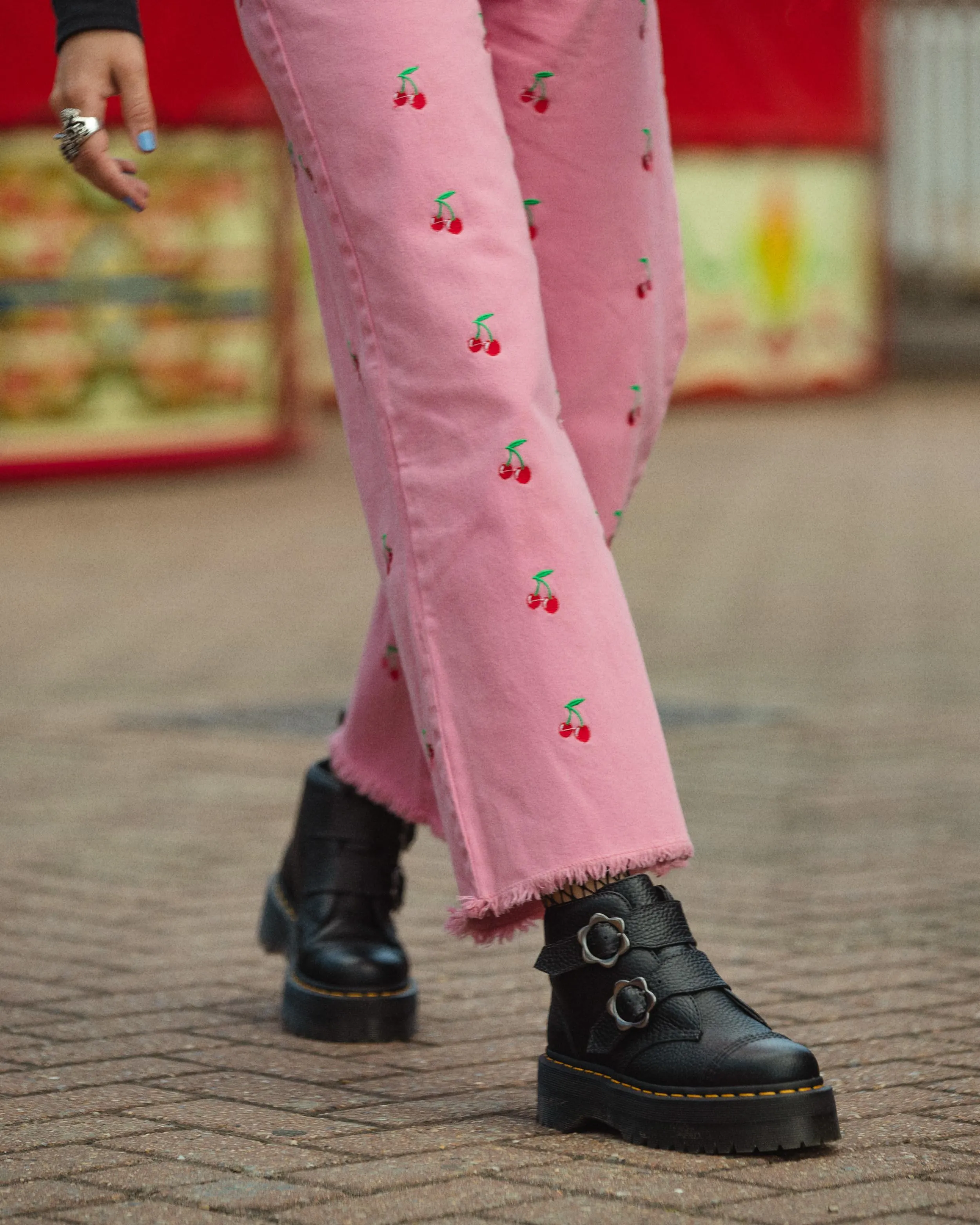 Devon Dr. Leather platform boots with floral buckle. Martens